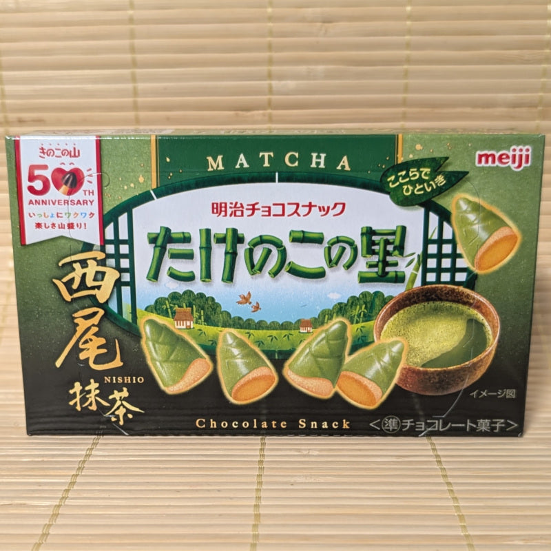 A green box of Nishio Matcha Green Tea Takenoko No Sato chocolate cookies on a tatami background.