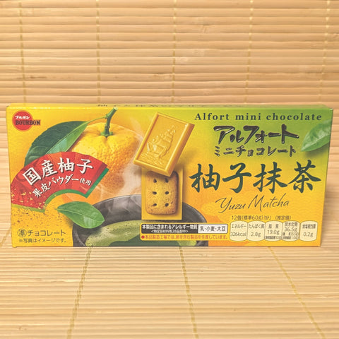 A yellow and green 60g box of Bourbon Alfort Mini Yuzu Matcha Chocolate featuring fresh yuzu fruit and matcha tea graphics on a bamboo mat.