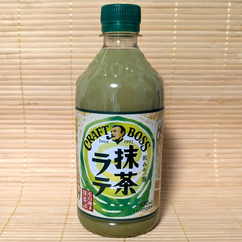 Bottle of Craft Boss matcha latte on a wooden background