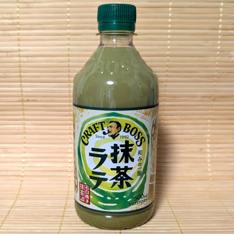 Bottle of Craft Boss matcha latte on a wooden background