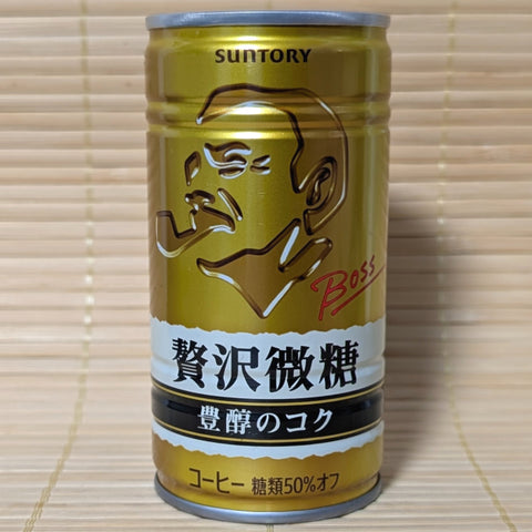 Suntory Zeitaku Luxury Boss Blend coffee can on a wooden surface