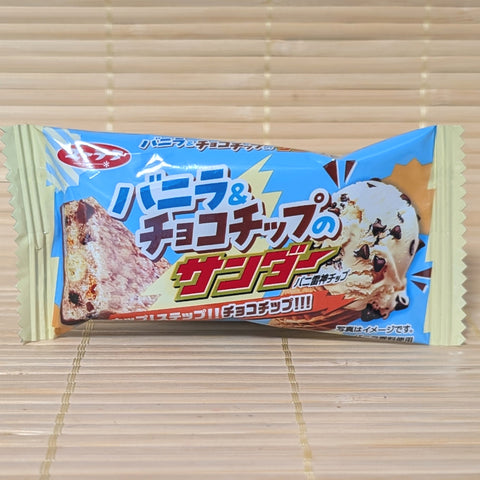 A light blue wrapper of Black Thunder Vanilla and Chocolate Chip mini bar featuring a scoop of ice cream.