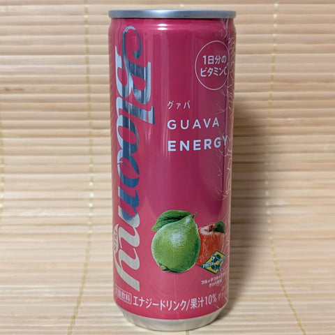 A vibrant pink 250ml can of Bloomy Guava Energy drink with botanical fruit graphics, photographed on a traditional Japanese tatami background.

