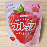 A Calbee freeze dried strawberry cracker chips in a heart shape. The package is displayed on a tatami surface