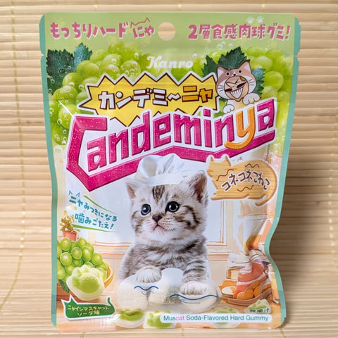 A pack of CandemiNYA Nyain Muscat Soda gummies displayed on a traditional tatami background.