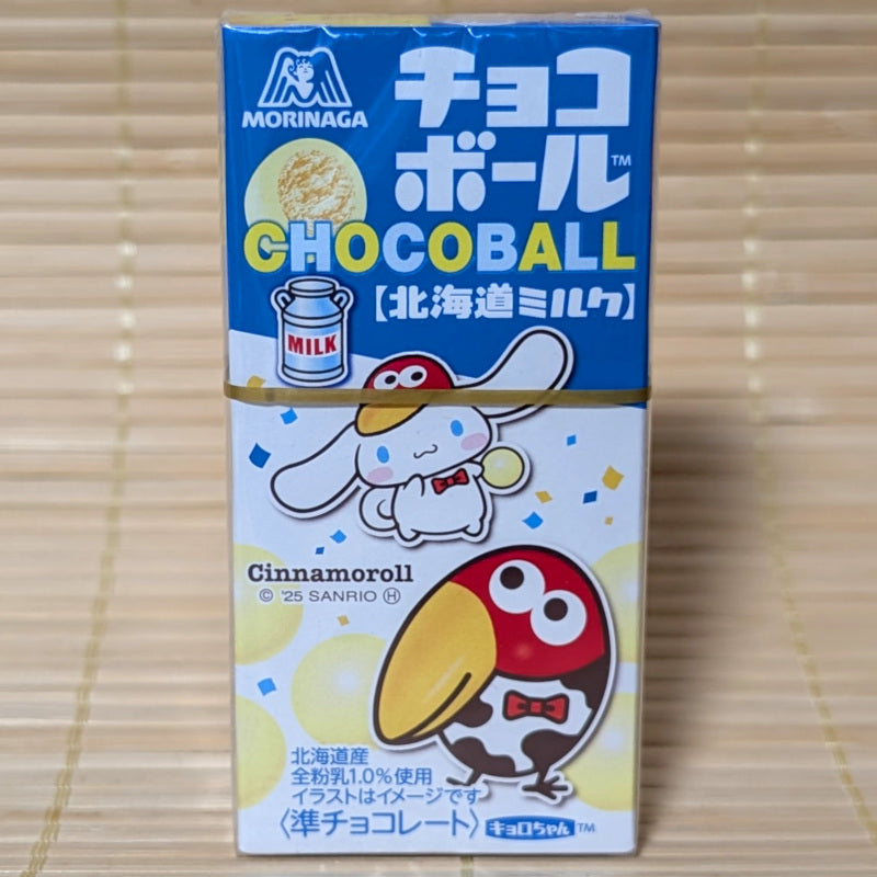 Morinaga Chocoball Hokkaido Milk White Chocolate balls with Cinnamoroll packaging on a wooden surface