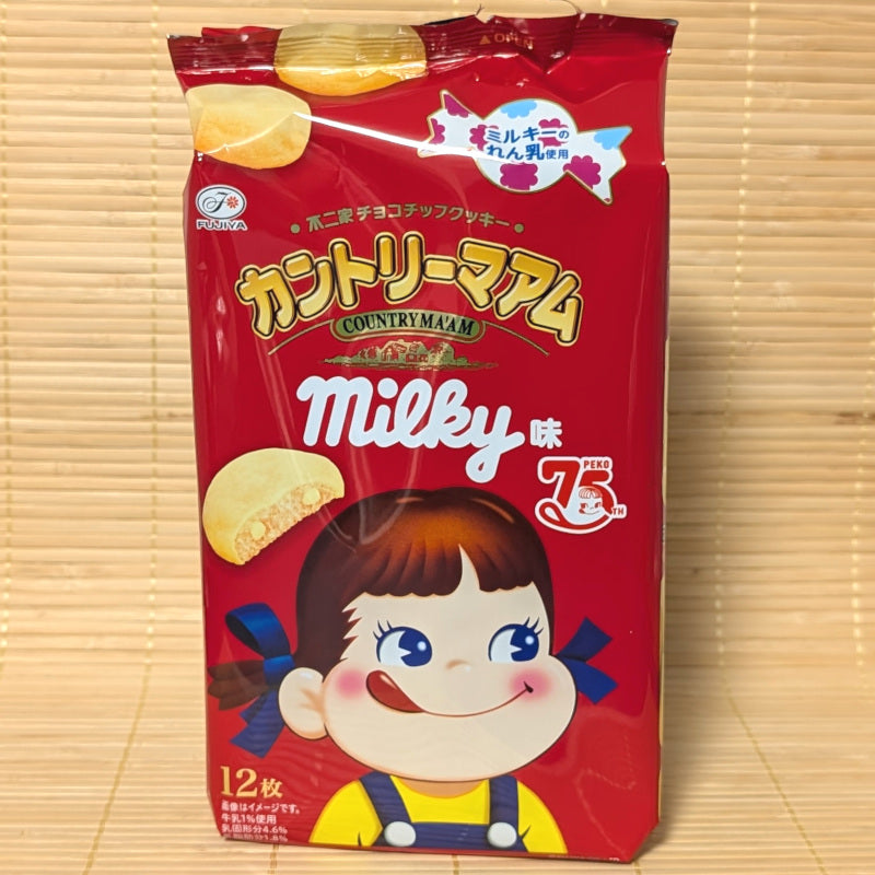 Red packaging of Country Ma'am Milky condensed milk flavor on a wooden background