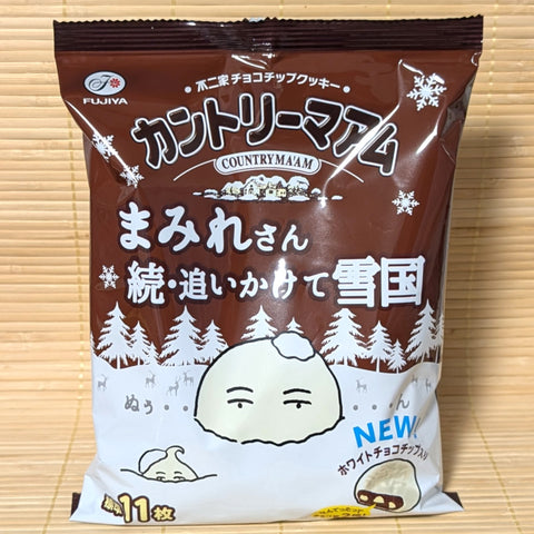 A pack of Fujiya Country Ma'am Mamire White Chocolate winter edition cookies. Displayed on a tatami surface.