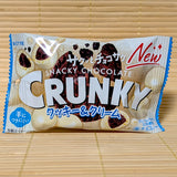 A pack of Crunky Snacky Chocolate Cookies and Cream Balls displayed on a tatami background.