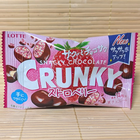 A package of Lotte Crunky balls with strawberry chocolate flavor. The packaging is pink with images of strawberries and chocolate pieces.

