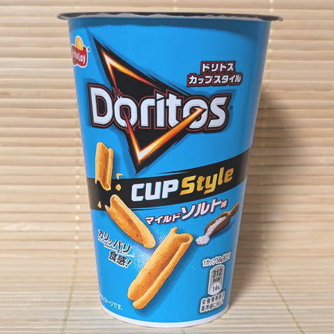 A bright blue Doritos Cup Style container on a tatami background showing S-curled corn sticks and a salt scoop graphic.