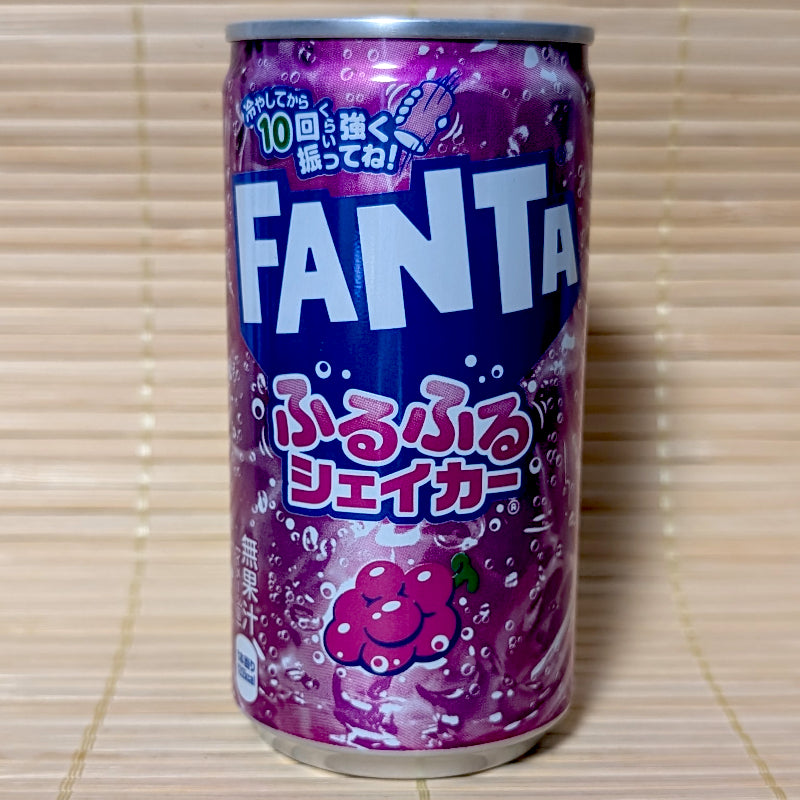 A purple Fanta Furu Furu Shaker Grape can on a tatami background featuring instructions to shake the can 10 times for jelly consistency.