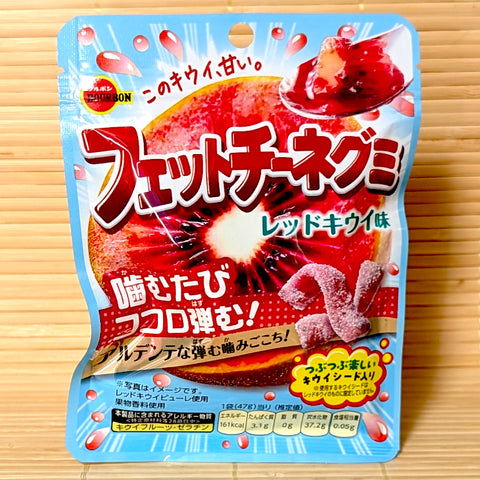 A brightly designed 47g pouch of Fettuccine Red Kiwi gummies showing fresh red kiwi slice graphics on a bamboo mat.