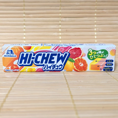 A Morinaga Hi-Chew Citrus Trio version that combines lemon, mikan orange, and pink grapefruit. The package is displayed on a tatami surface