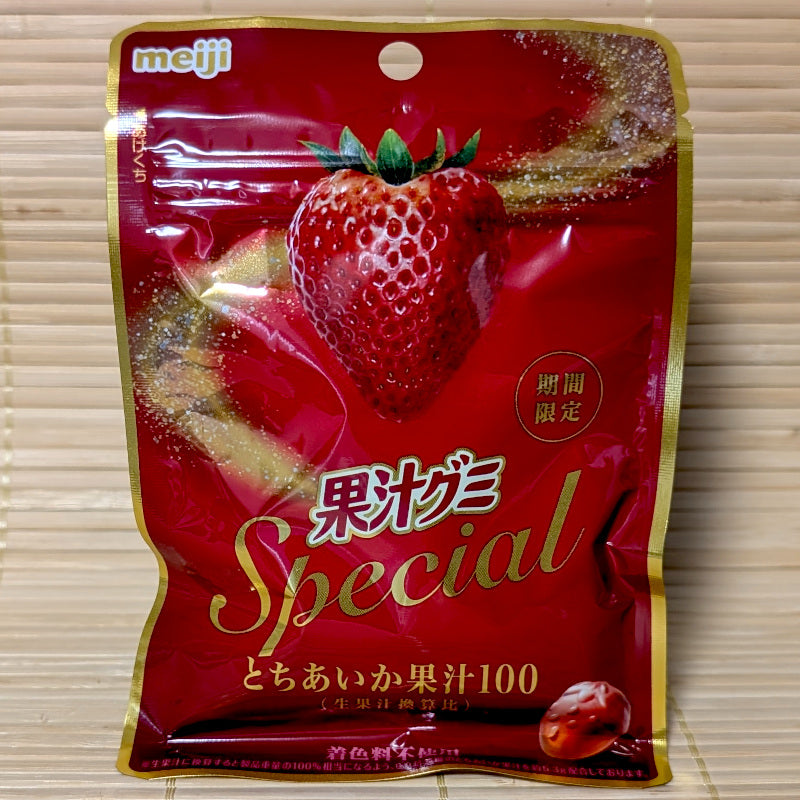A pack of SPECIAL Strawberry 100% juice Kaju Gummies by Meiji. Displayed on a tatami background.