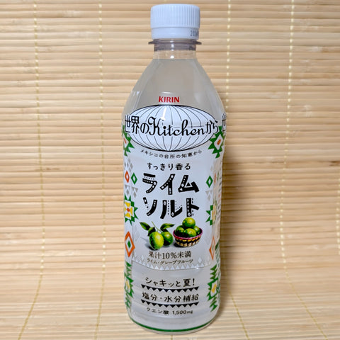 A 500ml bottle of Kirin Lime Salt drink featuring green and orange geometric patterns and a graphic of fresh limes.