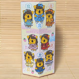 Front and back views of a pink 46g hexagonal box of Koala's March Cutie Street Strawberry Biscuits showing anime koala idol characters on a bamboo background.