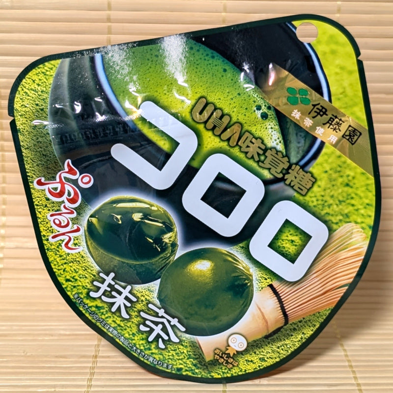 A pack of UHA Kororo Green Tea, Matcha, Gummy Candy on a tatami background.