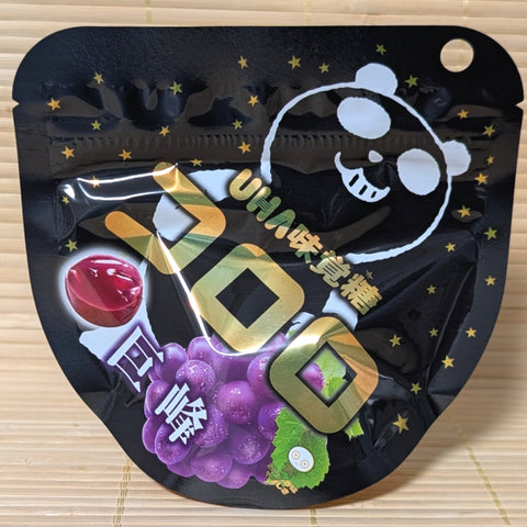 UHA Kororo Kyoho Grape limited edition pack on a tatami background.