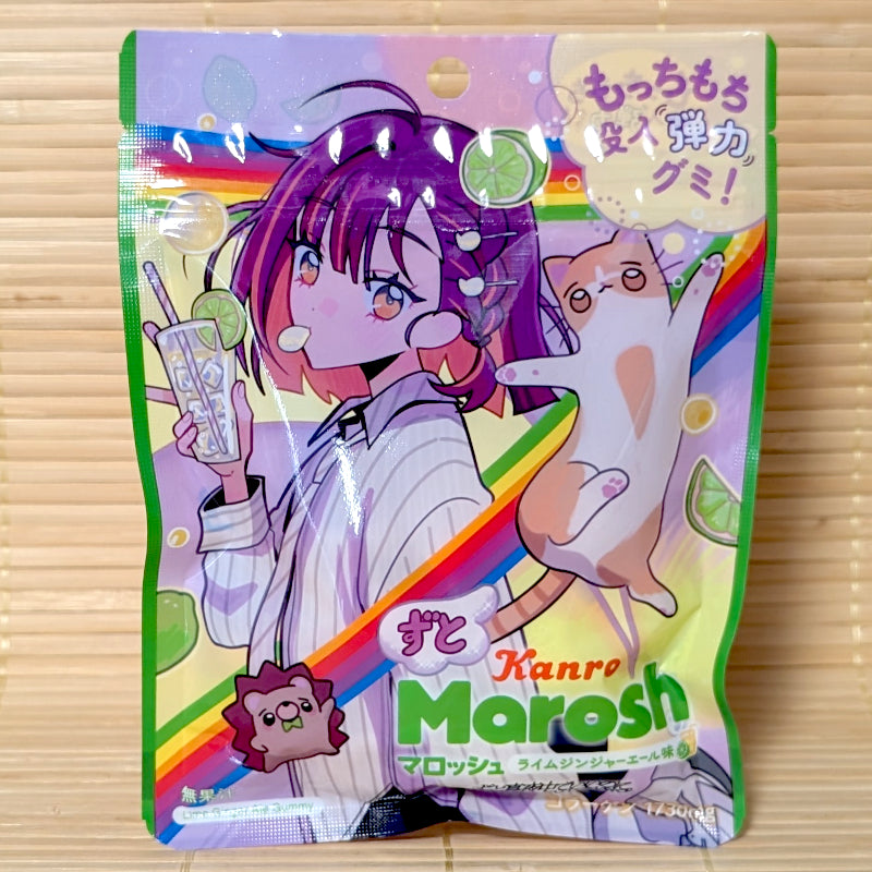 A colorful 46g anime art pouch of Kanro Marosh Lime Ginger Ale marshmallow gummies on a bamboo mat.