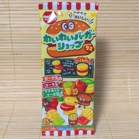 Colorful strip of Meigum Waiwai Burger Shop mini gummies showing stackable burger and fry shapes.