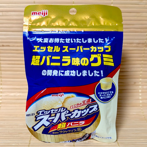 Blue and white pouch of Meiji Essel Super Cup Ultra Vanilla gummies shaped like tiny ice cream tubs.