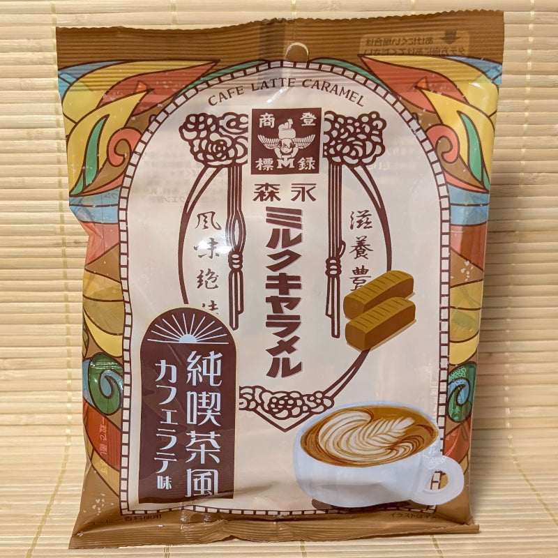 A cream and brown Morinaga Milk Caramel bag on a tatami background featuring latte art, two caramel cubes, and retro Japanese cafe-style motifs.