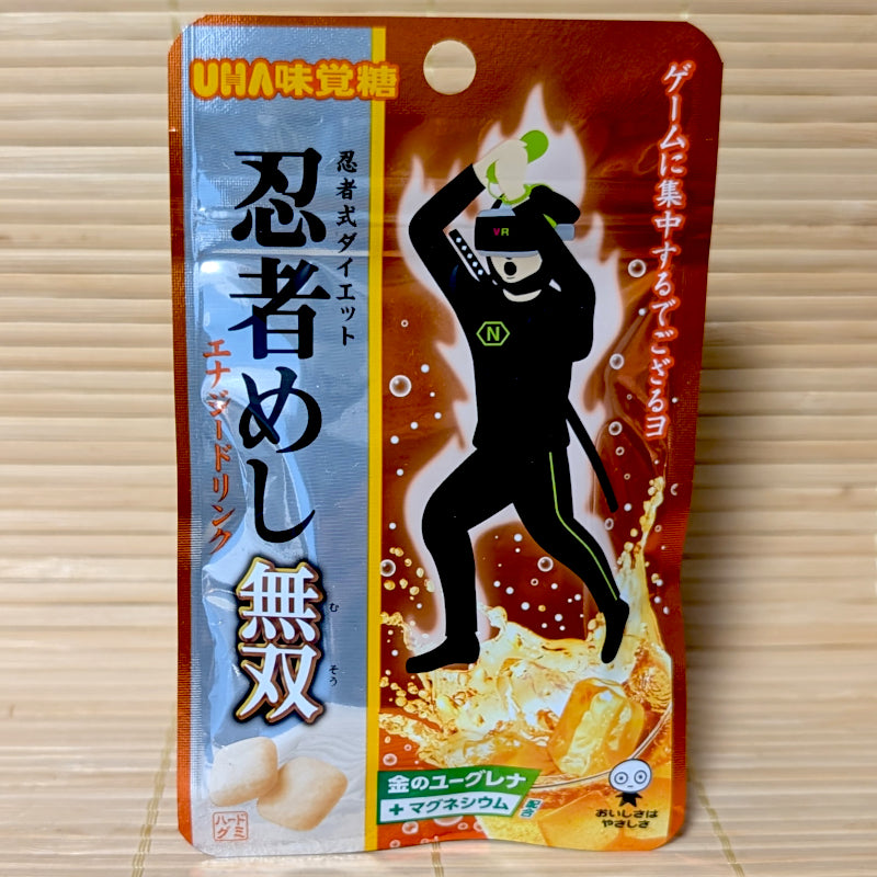 Metallic pouch of Ninja Meshi Musou energy drink gummies featuring a VR ninja character.