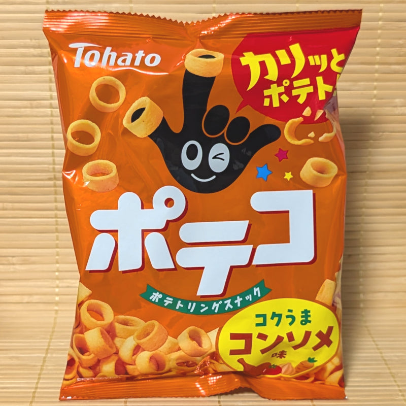 A bright orange bag of Tohato Poteko Potato Ring Snack Rich Consomme featuring potato ring graphics on a bamboo background.   