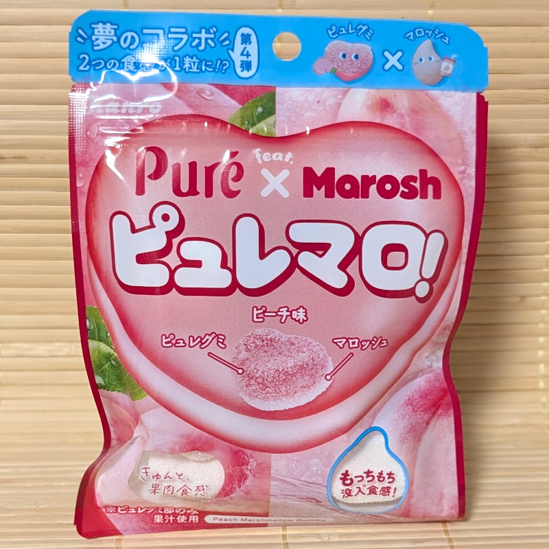 A pink and blue pouch of Kanro Puré x Marosh Peach marshmallow gummies is displayed on a tatami background.