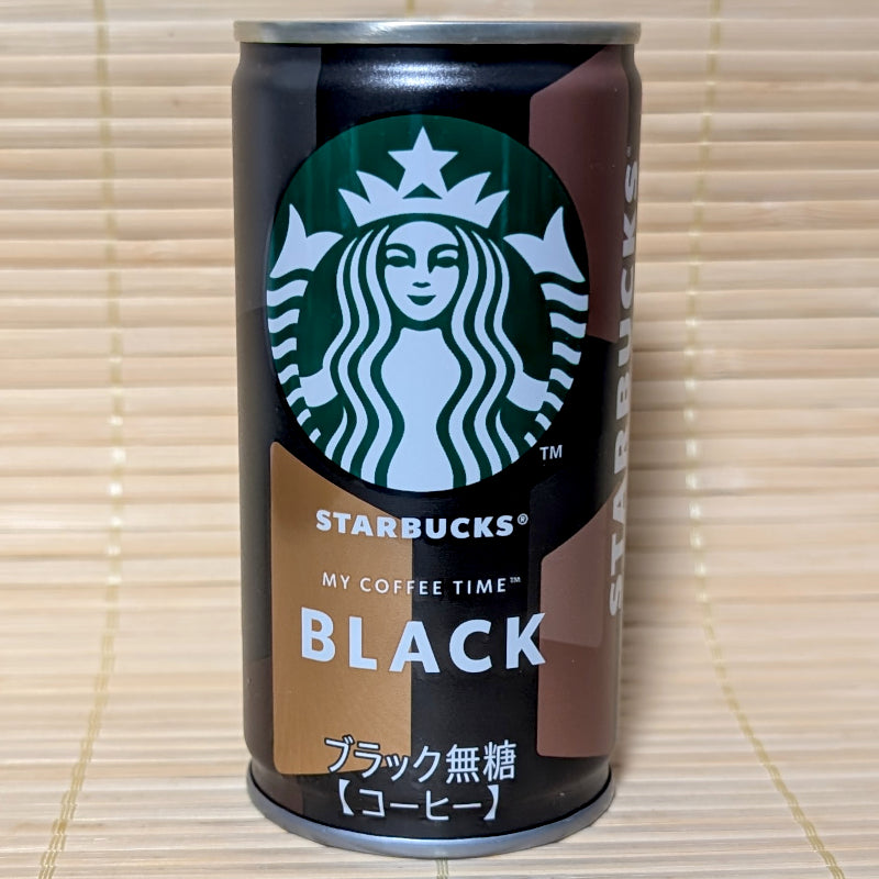 A Japanese Starbucks can of "My Coffee Time" Black coffee on a wooden surface
