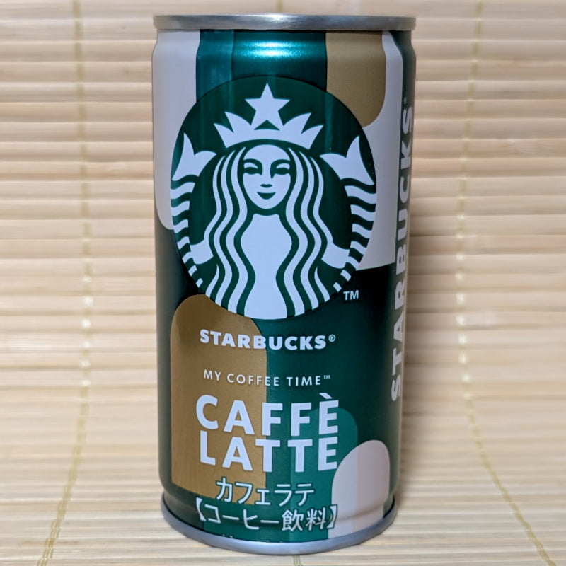 A Japanese Starbucks Caffè Latte can on a light wooden background