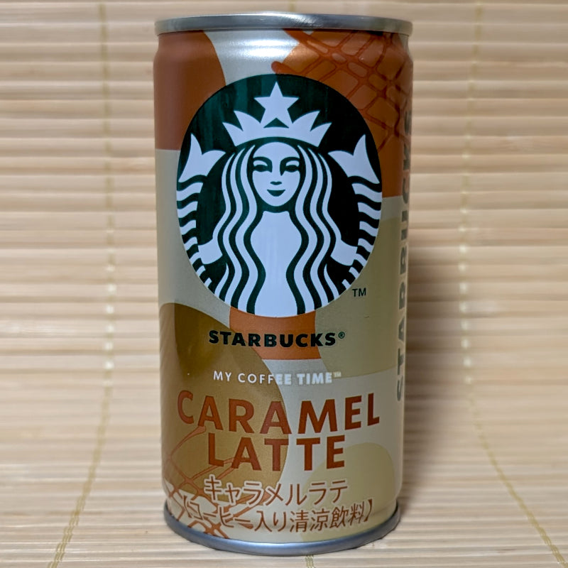 Starbucks Caramel Latte can on a wooden surface