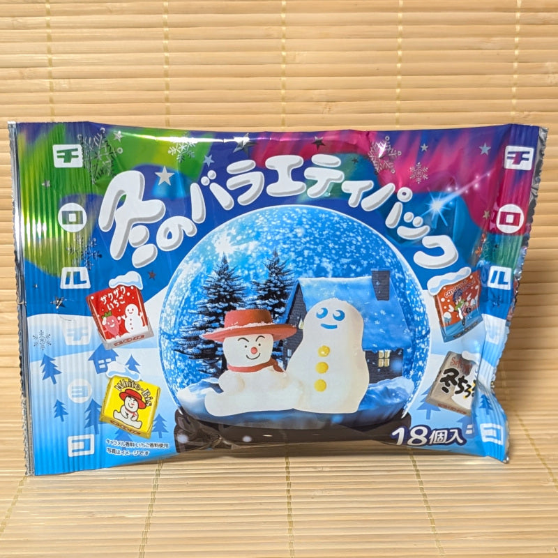 A variety bag of 18 mini Tirol Chocolates with a winter themed image on the front.