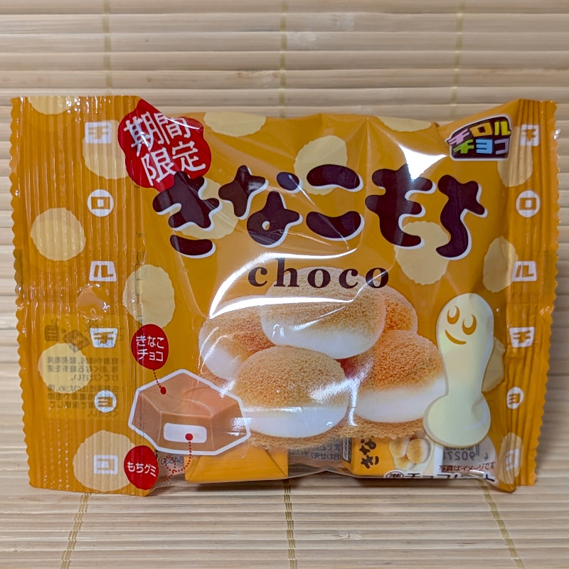 An orange and yellow 33g bag of Tirol Kinako Mochi featuring kinako-dusted mochi illustrations on a bamboo mat.