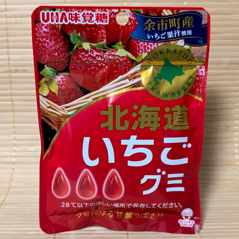 A pouch of UHA Hokkaido Strawberry gummy candy, featuring images of strawberries and Japanese text, indicating limited edition and 40 grams weight.

