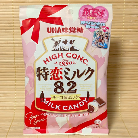 A bag of UHA Milk candies with chocolate centers. Displayed on a tatami background.