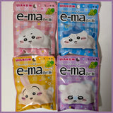Four packages of UHA e-ma muscat grape candy with cartoon characters on a white background