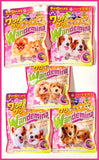 Five packages of Wandemina dog shaped gummies with colorful packaging featuring cute young dogs. It is part of the Candemina candy series.