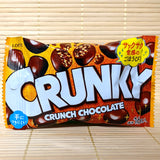 A package of Lotte Crunky Crunch Chocolate, featuring mini milk chocolate balls with malt puffs, wrapped in a colorful foil packet.